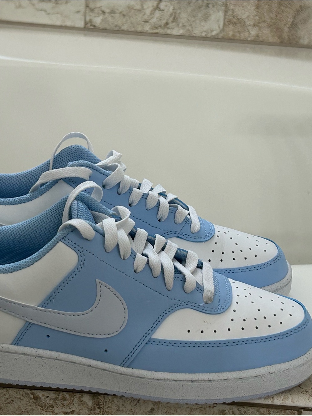 Nike Light Blue Running Sneakers with Black Swoosh Detail